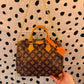 The Regina purse